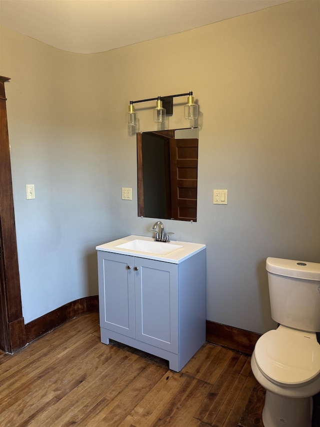 76 Center St, Richford, VT 05476 - half bathroom with vanity and wood finished floors