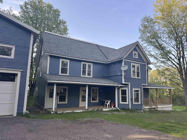 76 Center St, Richford, VT 05476 - view of front of property with covered porch, roof with shingles, and a front yard