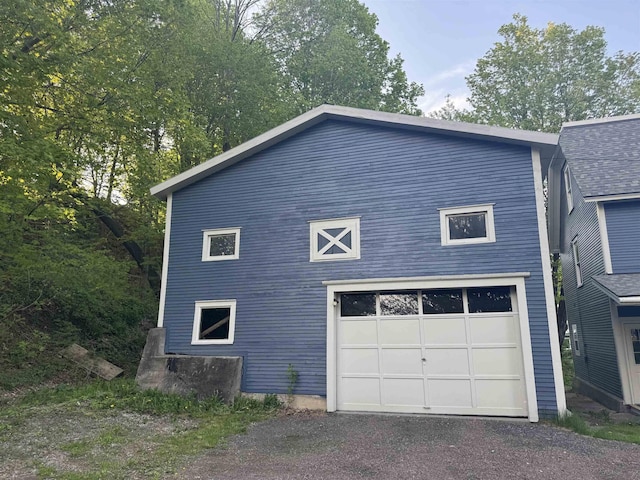 76 Center St, Richford, VT 05476 - view of side of property featuring a detached garage