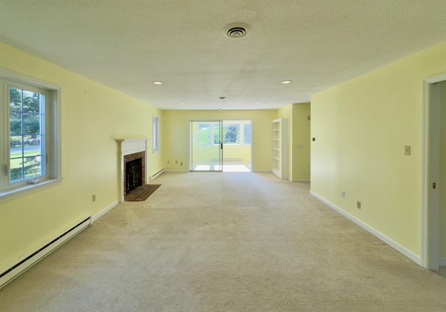 unfurnished living room featuring a baseboard radiator, light colored carpet, a fireplace with flush hearth, baseboards, and a textured ceiling