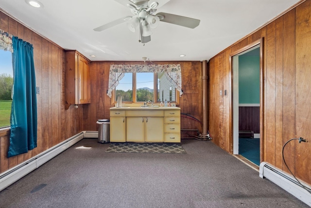 491 Brook Rd, Goshen, NH 03752 - interior space featuring baseboard heating, dark colored carpet, wood walls, ceiling fan, and recessed lighting