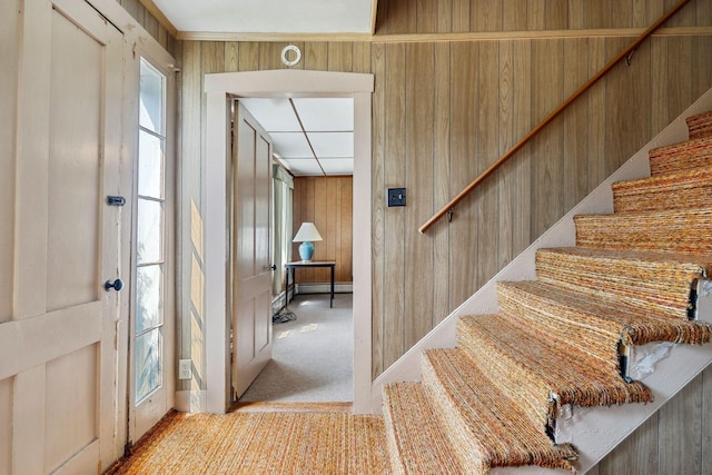 491 Brook Rd, Goshen, NH 03752 - foyer entrance featuring wooden walls, stairs, carpet, and baseboard heating