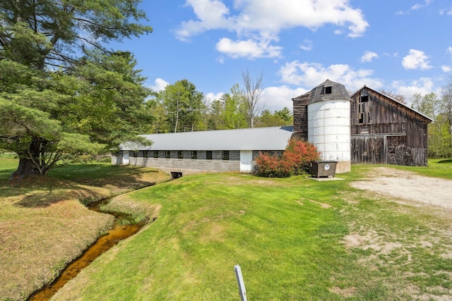 491 Brook Rd, Goshen, NH 03752 - view of barn featuring a yard
