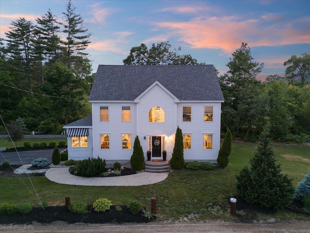 34 Coles Pond Rd, Somersworth, NH 03878 - colonial house with a front lawn and a shingled roof