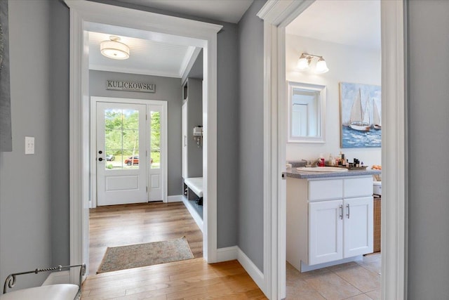 34 Coles Pond Rd, Somersworth, NH 03878 - foyer with light wood finished floors and baseboards