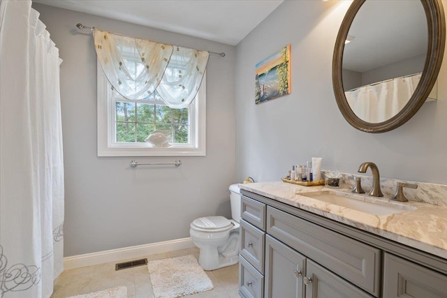 34 Coles Pond Rd, Somersworth, NH 03878 - full bath featuring baseboards, vanity, toilet, and tile patterned floors
