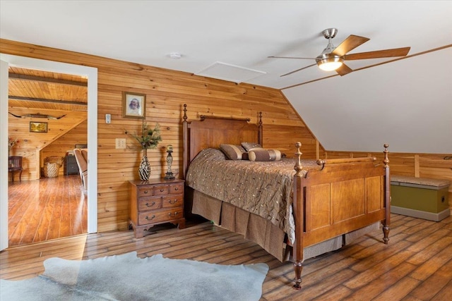 34 Coles Pond Rd, Somersworth, NH 03878 - bedroom with wooden walls, lofted ceiling, and wood-type flooring