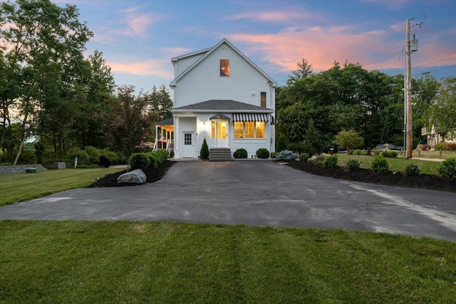 34 Coles Pond Rd, Somersworth, NH 03878 - view of front of property featuring asphalt driveway and a yard