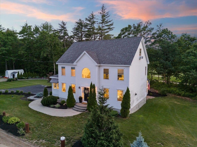 34 Coles Pond Rd, Somersworth, NH 03878 - colonial-style house featuring roof with shingles and a front yard