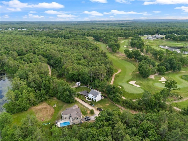 34 Coles Pond Rd, Somersworth, NH 03878 - aerial overview of property's location with a heavily wooded area, a golf course, and a large body of water