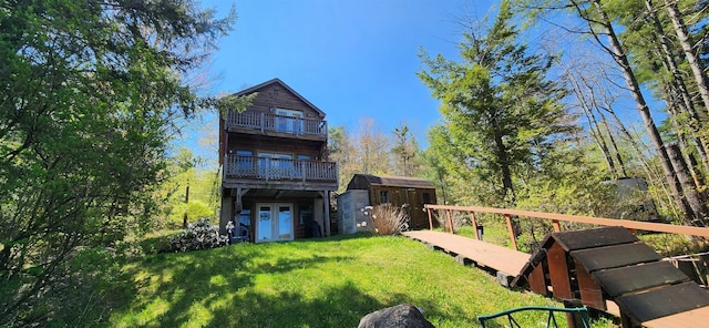 573 Granite Lake Rd, Nelson, NH 03457 - rear view of property with a balcony, a yard, and a wooden deck