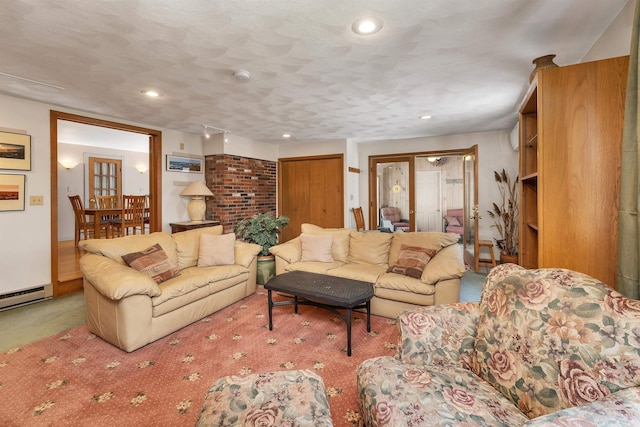 living room featuring carpet floors, recessed lighting, and a baseboard radiator