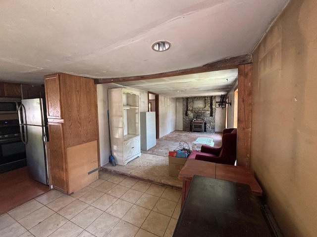 311 Clinton St, Concord, NH 03301 - hallway with light tile patterned floors