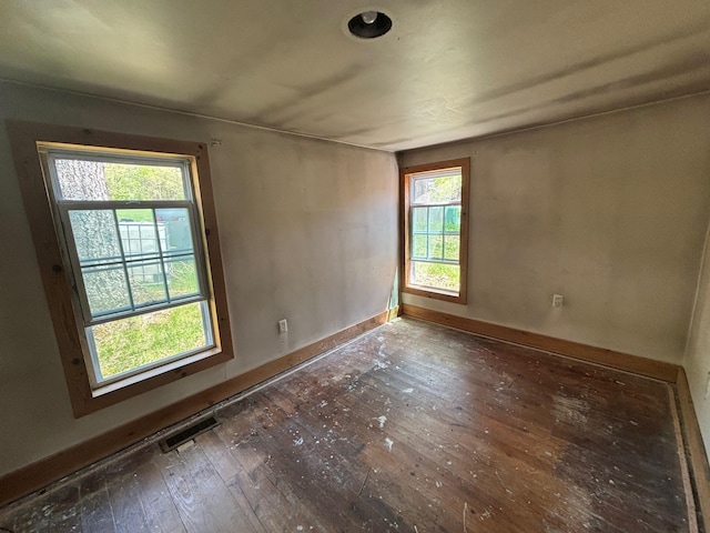 311 Clinton St, Concord, NH 03301 - empty room featuring hardwood / wood-style flooring and baseboards