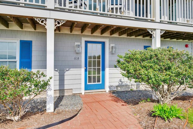 605 Ocean Blvd Unit 1, Hampton, NH 03842 - view of exterior entry featuring a balcony