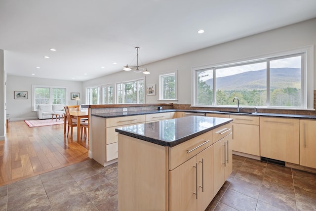 7 Timberbrook N, Dorset, VT 05251 - kitchen with a sink, light brown cabinetry, a peninsula, dark stone counters, and recessed lighting