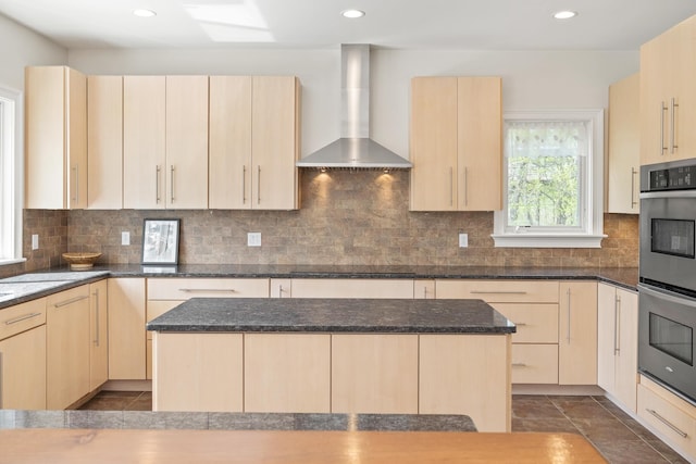 7 Timberbrook N, Dorset, VT 05251 - kitchen featuring wall chimney exhaust hood, double oven, light brown cabinetry, recessed lighting, and dark stone countertops