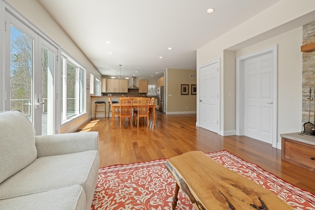 7 Timberbrook N, Dorset, VT 05251 - living area featuring light wood-style floors, recessed lighting, and baseboards