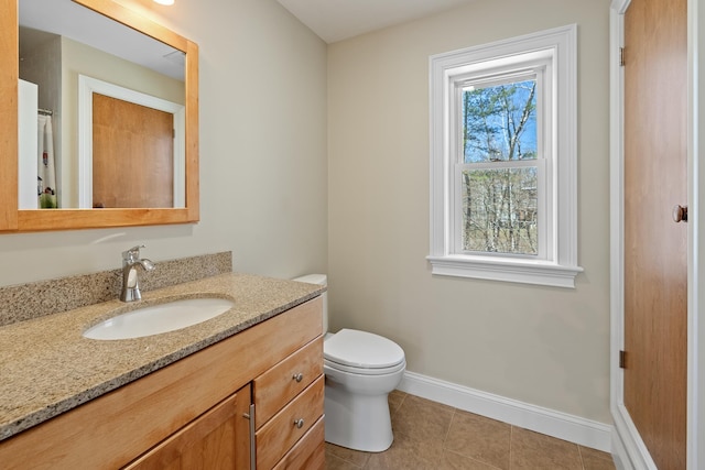 7 Timberbrook N, Dorset, VT 05251 - bathroom featuring baseboards, tile patterned floors, vanity, and toilet
