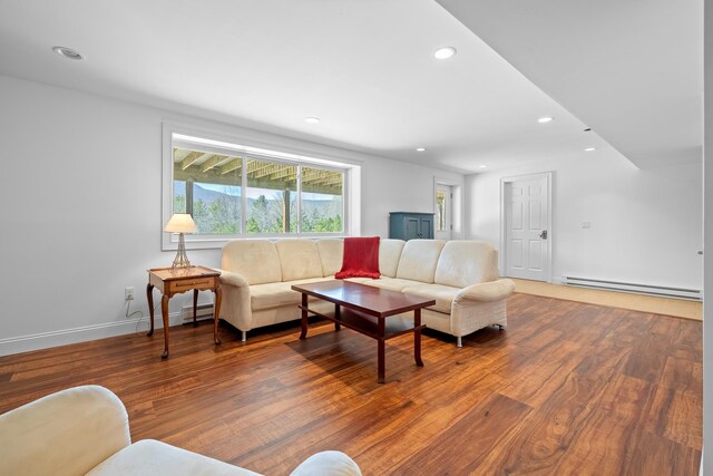 7 Timberbrook N, Dorset, VT 05251 - living area with a baseboard radiator, recessed lighting, wood finished floors, and baseboards