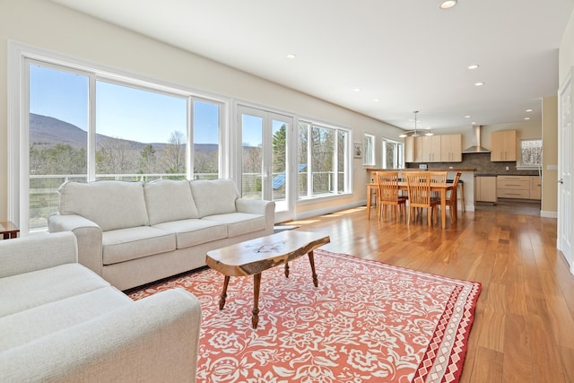 7 Timberbrook N, Dorset, VT 05251 - living area with light wood-style flooring, recessed lighting, and a mountain view