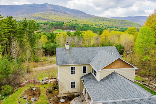 7 Timberbrook N, Dorset, VT 05251 - view from above of property with a heavily wooded area and mountains