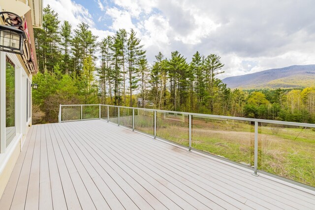 7 Timberbrook N, Dorset, VT 05251 - deck with a mountain view and a wooded view
