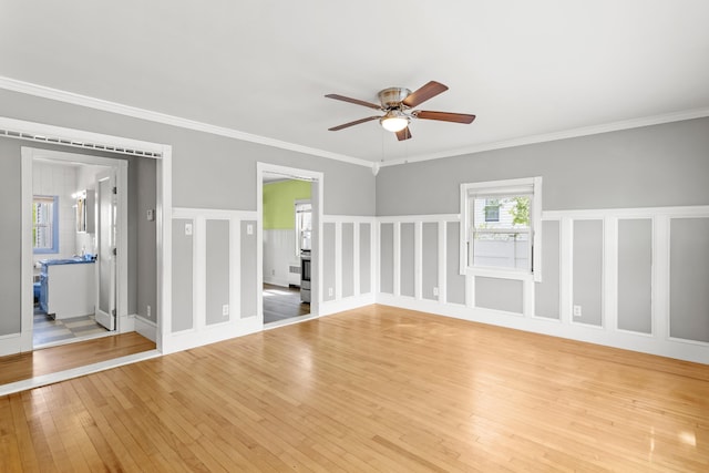 552 Dix St, Manchester, NH 03103 - unfurnished room featuring a ceiling fan, light wood finished floors, and ornamental molding