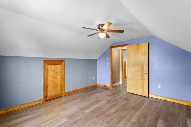 552 Dix St, Manchester, NH 03103 - additional living space with a ceiling fan, wood finished floors, lofted ceiling, and baseboards