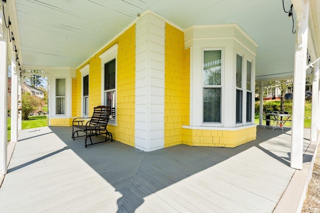 wooden deck with covered porch