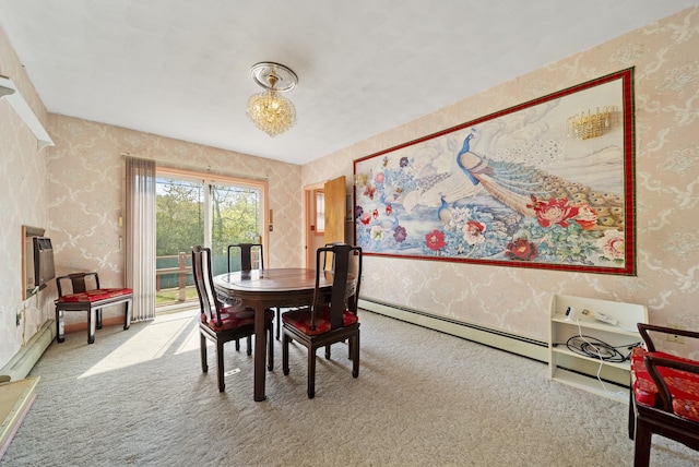 carpeted dining room with wallpapered walls and baseboard heating