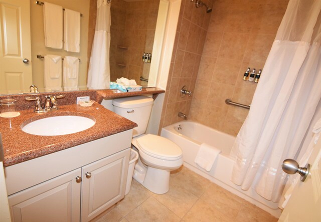 bathroom with tile patterned flooring, shower / bathtub combination with curtain, toilet, and vanity