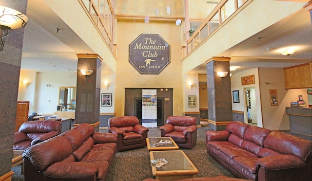 community lobby featuring a high ceiling and stairs