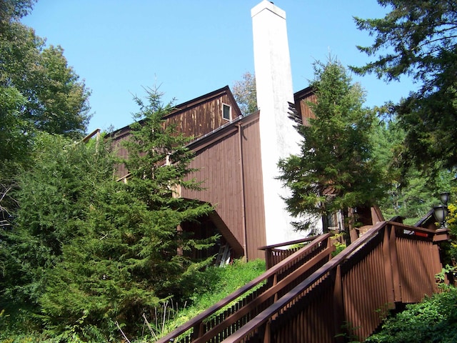 111 Forest Ln, Rochester, VT 05767 - view of side of home with a chimney