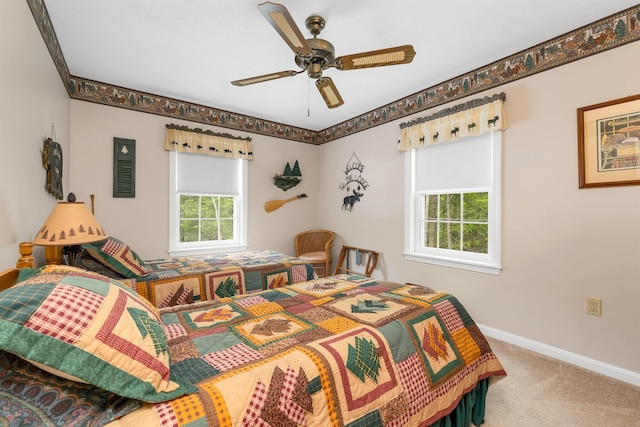 40-21 Harbor Way Unit 21, Wolfeboro, NH 03894 - bedroom with carpet, baseboards, and a ceiling fan