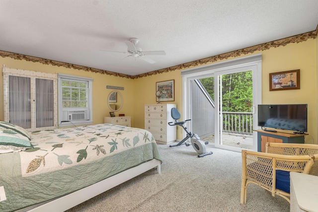 40-21 Harbor Way Unit 21, Wolfeboro, NH 03894 - carpeted bedroom featuring access to outside, a textured ceiling, and ceiling fan