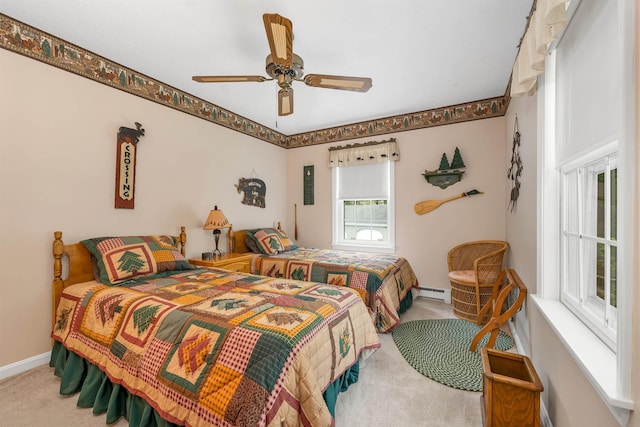 40-21 Harbor Way Unit 21, Wolfeboro, NH 03894 - bedroom with carpet, a baseboard heating unit, baseboards, and a ceiling fan
