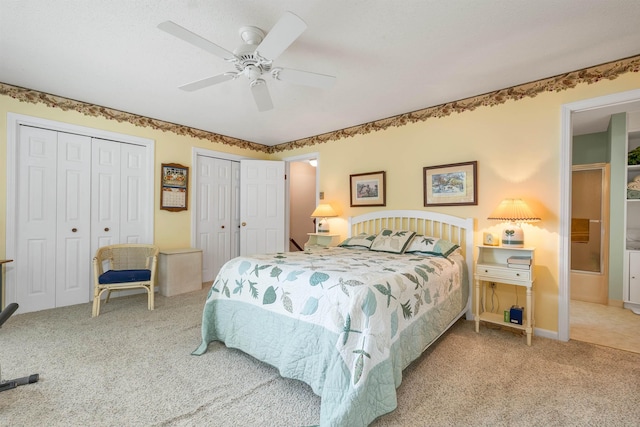 40-21 Harbor Way Unit 21, Wolfeboro, NH 03894 - carpeted bedroom with multiple closets, ceiling fan, and baseboards