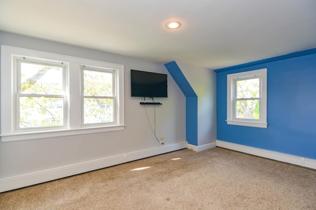 bonus room with baseboard heating, plenty of natural light, baseboards, carpet flooring, and recessed lighting