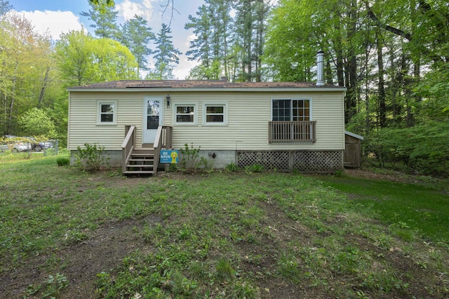 back of house with crawl space