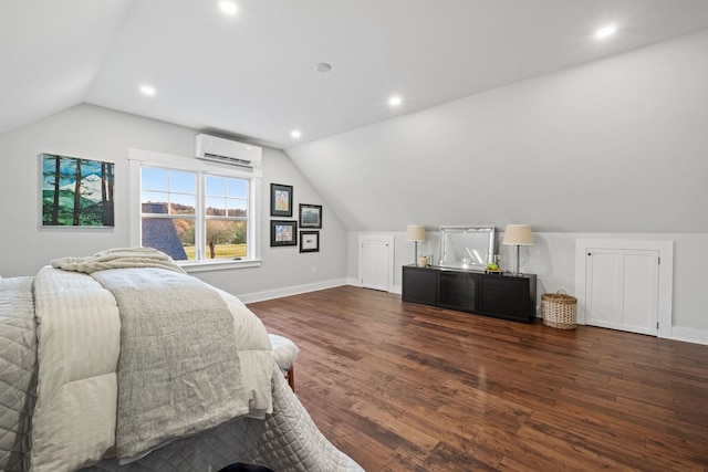 bedroom with a wall unit AC, lofted ceiling, dark wood-type flooring, baseboards, and recessed lighting