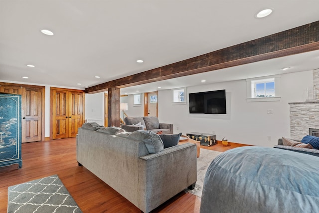 living room featuring wood finished floors and recessed lighting