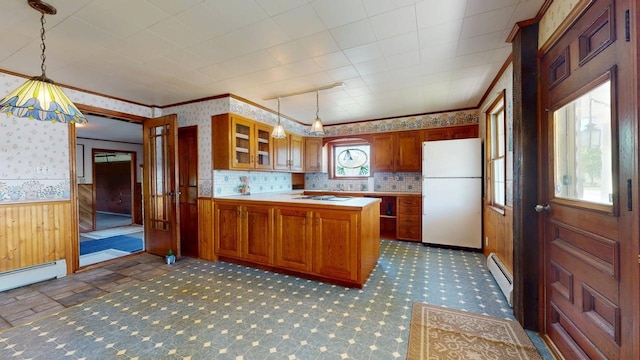 3005 Vt 78 Rte, Highgate, VT 05459 - kitchen featuring white appliances, baseboard heating, brown cabinetry, wallpapered walls, and light countertops