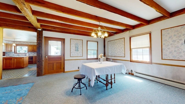 3005 Vt 78 Rte, Highgate, VT 05459 - carpeted dining space featuring beamed ceiling, a baseboard heating unit, wainscoting, a chandelier, and healthy amount of natural light