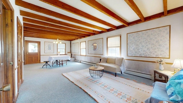 3005 Vt 78 Rte, Highgate, VT 05459 - living room with a baseboard heating unit, beam ceiling, a chandelier, and carpet floors
