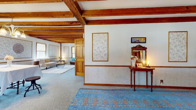 3005 Vt 78 Rte, Highgate, VT 05459 - dining space with beamed ceiling, carpet floors, baseboards, and a chandelier