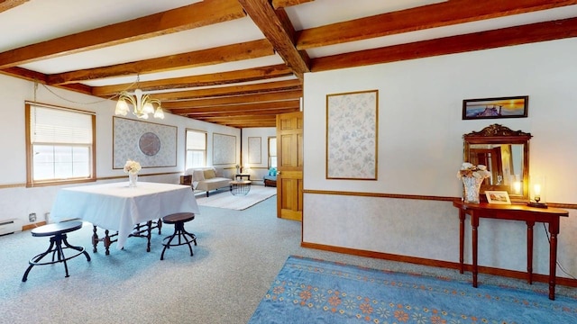3005 Vt 78 Rte, Highgate, VT 05459 - carpeted dining area featuring beamed ceiling, a chandelier, baseboards, and wallpapered walls