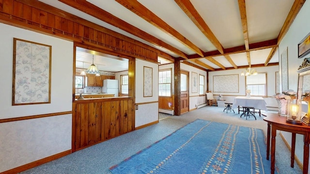 3005 Vt 78 Rte, Highgate, VT 05459 - sunroom / solarium with a baseboard radiator, a chandelier, beam ceiling, and baseboard heating