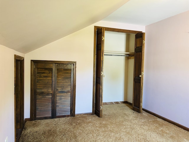 3005 Vt 78 Rte, Highgate, VT 05459 - unfurnished bedroom featuring light colored carpet, vaulted ceiling, baseboards, and a closet