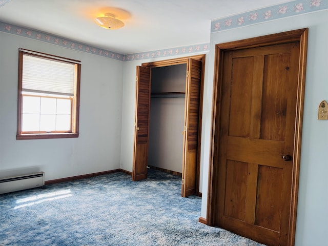 3005 Vt 78 Rte, Highgate, VT 05459 - unfurnished bedroom with carpet floors, baseboards, a baseboard radiator, and a closet